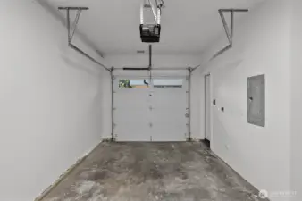 An oversized garage offers secure parking and additional storage space for all your needs.