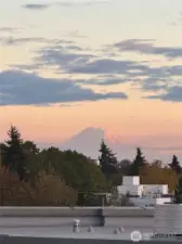 Gorgeous sunset glow highlighting Mount Rainier, providing an unbeatable natural backdrop.