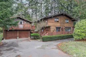 On the left is the detached 2 car garage with carriage house above--use for studio, office or guests.