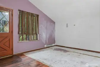 Vaulted ceiling in great room as you enter