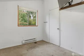 Previously used as guest bedroom--full bathroom with stacked W/D unit, too behind closed door