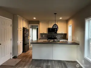 Down the hall is the primary bedroom