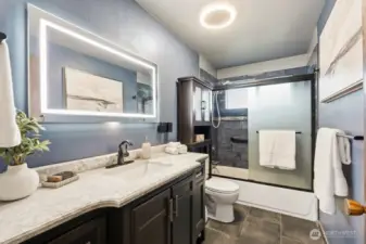 Updated bath with lighted mirror