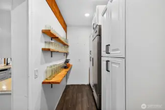 Ample walk-in pantry with fridge