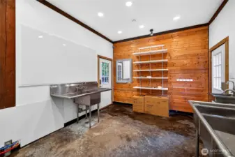 Heated tack room   1/2 bath  Hook ups for washer and dryer.