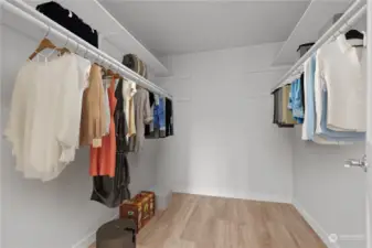 Virtually Staged. Walk-In Primary Closet.