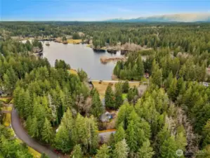 Birds eye view of your new home in relation to the lake! The property is located bottom, center of this photo!