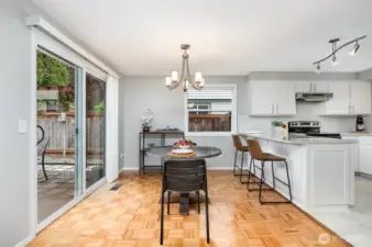 Dining area off the kitchen and slider to backyard