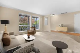 Or turn to the right into the spacious living and more formal dining room spaces - virtually staged.