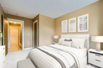 The second bedroom near the half bath makes it a comfortable and pleasant place for guests to stay. Virtually staged.