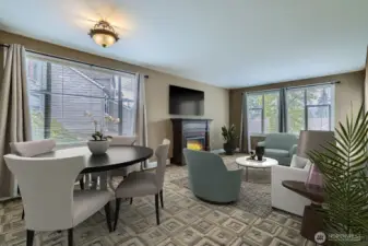 Pretty textured carpet, designer window coverings and the beautiful mantle for the electric fireplace create a lovely place to call home. Virtually staged.