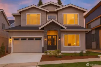 Timeless elegance in the heart of Lower Kennydale — this stunning two-story residence welcomes you with clean architectural lines, designer gray siding accented by rich brick detailing, and a striking covered entry framed by double doors. Impeccably landscaped with a wide driveway and pristine curb appeal, this home blends sophistication with inviting warmth