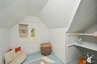 with a precious alcove in a dormer setup as a kids playroom.