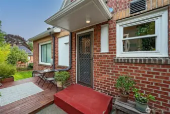 A concrete patio off of the kitchen has space for a BBQ