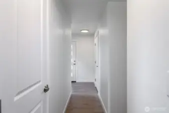 Hallway to front with Brand new LVP Floors