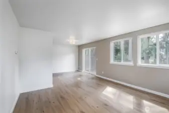 Living room that leads to back yard sliding glass door