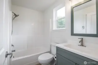 Main Bathroom upper level with new windows