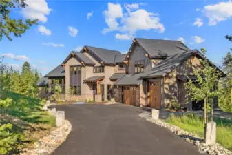 See you at the top of gated Skyline Ridge! Incredible attention to detail and superior finish work are combined in this surprisingly livable luxury mountain home. No detail has been forgotten - all the way to the three car garage, one Bay designed as a shop with 220 V electric with a space heater, EV ready hook up, and mechanical room plumbed for dog wash.  There is also a whole house fan and a generator!