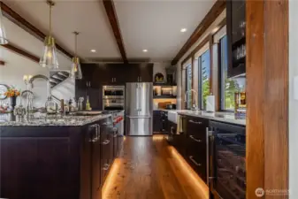 Kitchen is fully equipped all the way down to a handy wine fridge with high end Wolfe, Thermador, Bosch, and LG appliances