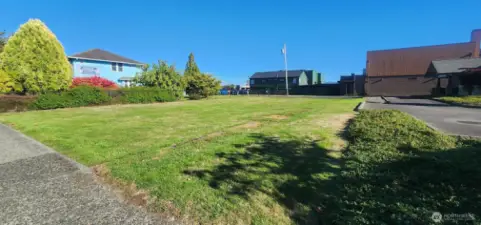 From Front Right corner looking at neighboring garden space