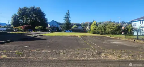 Back parking view from alley access, 8 spots total