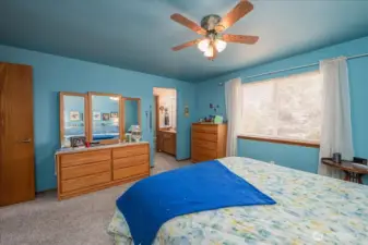 Primary bedroom with ensuite 3/4 bathroom.