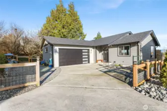 Attached 2 car garage and extra gravel parking for RV/boat/toys!