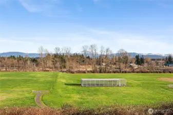 Trail to school district fields right from your yard