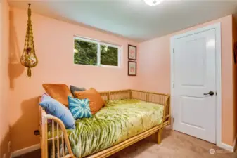 Take the hall straight back to this 2nd of three bedrooms.