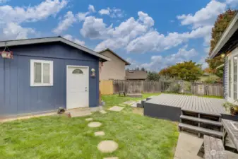 looking from side yard in back is the 12x12 "studio" that has power, heat & A/C.