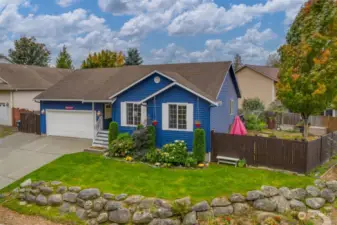 2 car garage, but also an extra parking spot on left of driveway.