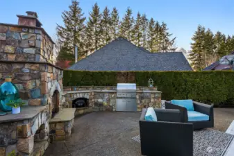 Outdoor Kitchen with BBQ, 2 additional gas Burners, sink, and a wood burning Fireplace~