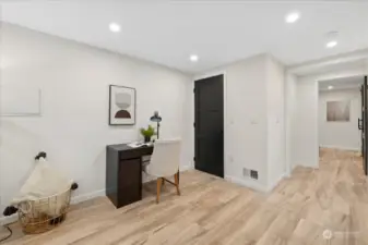 Large storage closet and other side of living area leads to bathroom and bedroom.