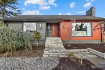 Easy landscaping with new siding and beautiful new front door.