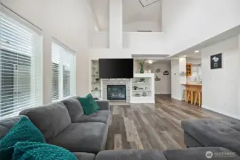 Gas fireplace, built in shelving, and plenty of natural light!
