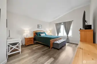 Sizeable Primary bedroom with attached bathroom, as well as walk-in-closet.