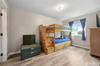 Bedroom #2, w/ walk in closet on left.