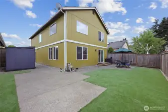 Evergreen turf and aggregate patio make for comfort w/ minimal maintenance!
