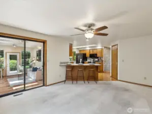 Family room opens to heated sunroom