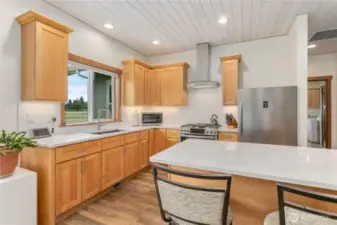 Equipped with quality stainless steel appliances, this kitchen blends style and function with a seamless, built-in look and modern convenience.