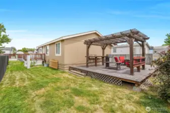 Speaking of shade, check out this large deck in back with a heavy-duty gazebo for shade!