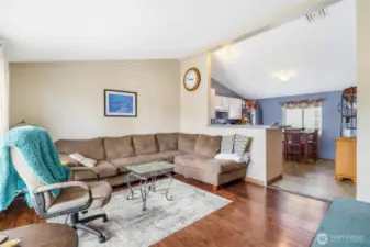 This spacious living room has room enough for the couches, a large TV and lots of good conversation.