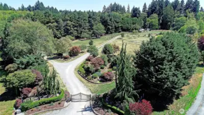 Gated entrance, mature landscaping