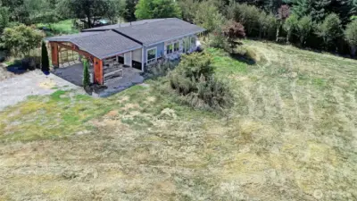 Partially finished office building with RV bay