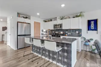 Kitchen with pantry, island and eating space