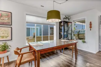 Dining area between kitchen and living room