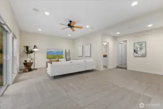 One more view of the expansive family room with lovely high ceilings.