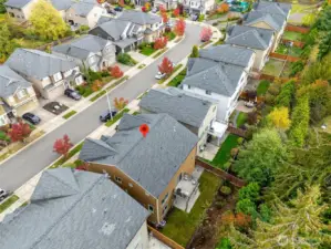 Beautiful aerial perspective showcasing the home’s location within a quiet, tree-lined community. Conveniently positioned near local parks, trails, and shopping with easy access to major routes.