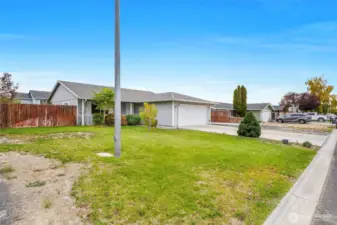 The left side yard in front.