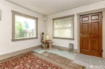 Large windows in the Living room which all the windows that open, have screens!